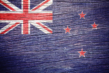 New Zealand Flag painted on old wood texture 
