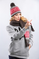 blonde woman in a grey sports hoodie