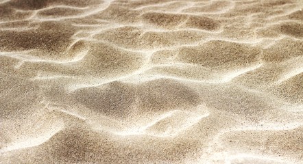 Fototapeta na wymiar waves of sand background