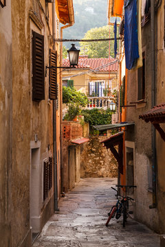 Fototapeta Charming old alley in Opatija village, Croatia