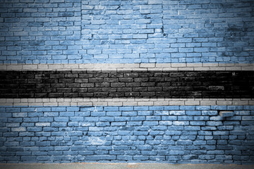Ziegelsteinmauer mit Flagge Botswana