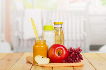 set of children's food and fresh fruit on the table