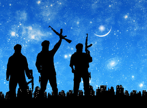 Silhouette of men with rifle standing against city at night