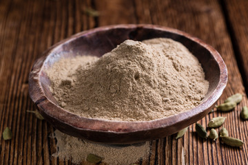 Cardamon Powder on wood