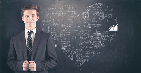 Teenager and blackboard