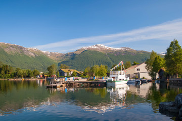 Fototapeta na wymiar Norway. Pier in the deerena on the bank of the lake in summer da