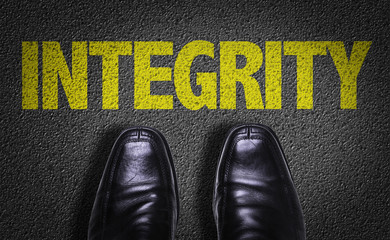 Top View of Business Shoes on the floor with the text: Integrity