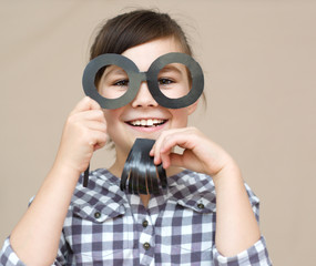 Funny girl with fake beard and glasses