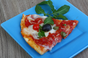 Pizza with salami and mozzarella