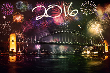 Fireworks with numbers 2016 over the bridge