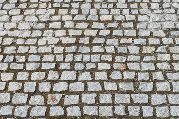 Old road paved with granite stones