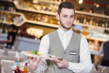 Waiter man in restaurant
