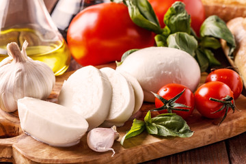 Mozzarella, tomatoes, garlic and basil.