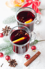Hot spicy winter drink on white