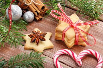 Christmas cookies with decoration on wooden background