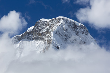 Fototapeta na wymiar Snow covered mountain peak and blue sky, Cordillera Blanca, Peru