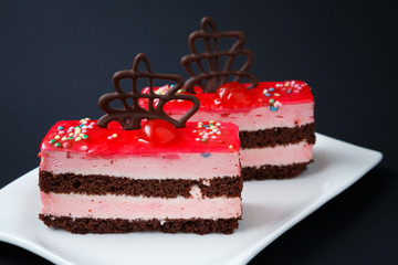 Sweet colorful desserts on a black background