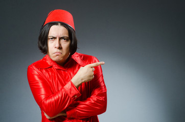 Man wearing red fez hat