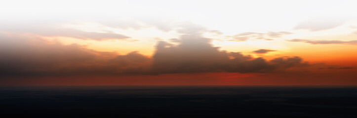 Fototapeta na wymiar Horizontal vivid orange gold motion abstraction horizon sunset w