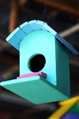 Obraz na płótnie Canvas colorful wooden bird house.
