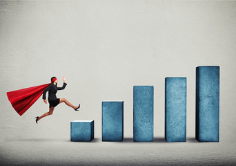businesswoman in superhero cloak running up