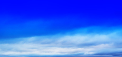 Fototapeta premium HORIZONTAL VIVID BLUE CLOUDSCAPE DRAMATIC BOTTM ALIGNED CLOUDS B