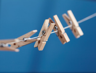 wooden clothespins on a rope