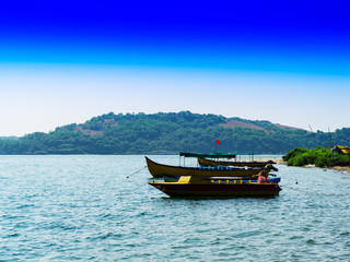 Fototapeta na wymiar Horizontal vivid indian boats travel transportation background b