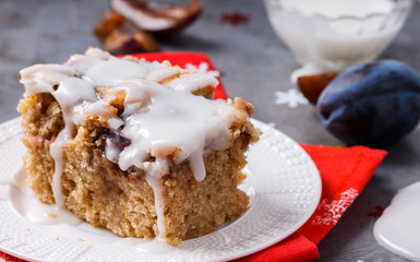 Plum cake in white icing for Christmas and New year