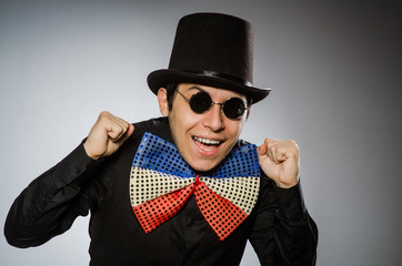 Funny man with sunglasses and vintage hat