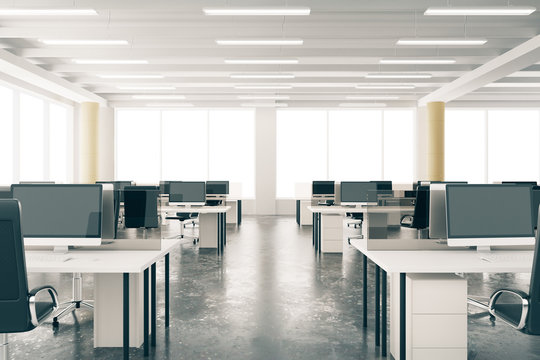 Modern open space loft office with furniture, concrete floor, bi