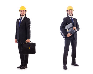 Young architect wearing hardhat on white