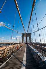 Fototapeta premium Brooklyn bridge in New York on bright summer day