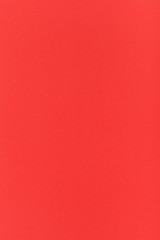 red colored vertical sheet of paper