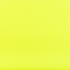 lemon yellow colored square sheet of paper