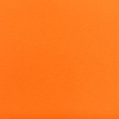 orange colored square sheet of paper