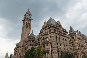 Fototapeta na wymiar Old City Hall of Toronto against a cloudy sky