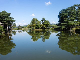 Fototapeta na wymiar Kanazawa, Japan - September 28, 2015: Kasumi pond in Kenrokuen garden