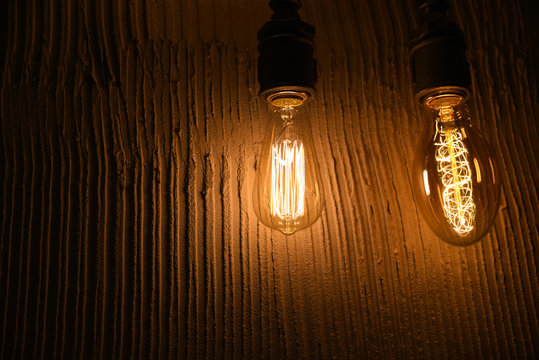 Vintage Edison Type Bulbs on Concrete Background