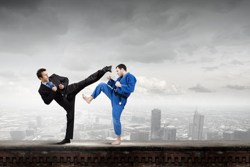 Fototapeta na wymiar Karate man in blue kimino