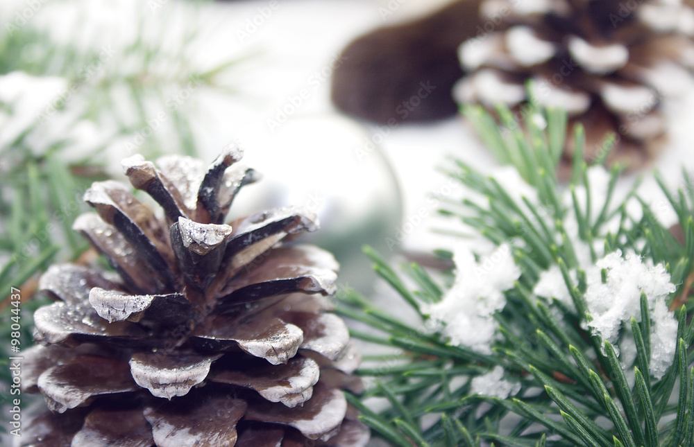 Wall mural composition with christmas tree and pinecone on white rustic woo