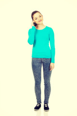 Fototapeta premium Teen with mobile phone.