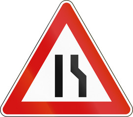 Slovenia road sign - Road narrows on the right side