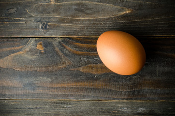 Fresh egg on wooden background,food ingredient