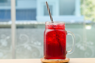 Ice red drink in the glass