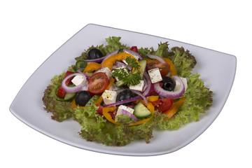 Fresh vegetable greek salad on the table