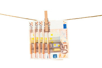 Euro notes on clothesline.  Money laundering euros