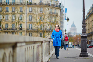 Fototapeta na wymiar Beautiful young tourist in Paris