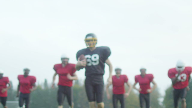 American football players at team practice