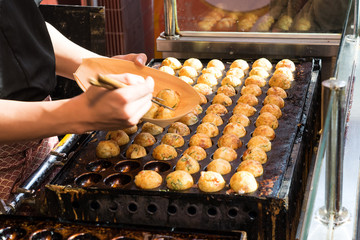 Cooking of Takoyaki one of the most popular food in Osaka